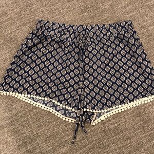 Size medium navy shorts with diamond pattern
